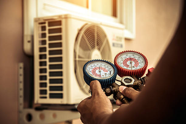 Professional Hvac technician working in Lewisville, IN